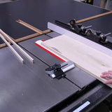 Table saw cutting wooden board with miter gauge and strips for precise woodworking